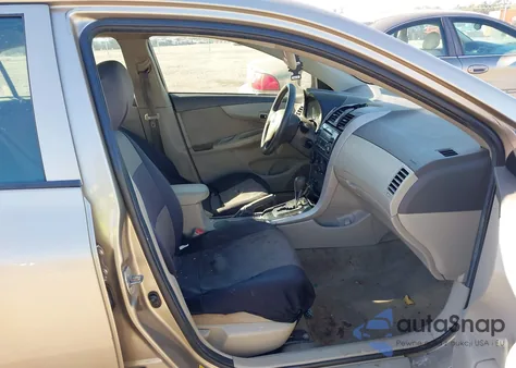 2009 Toyota Corolla from USA, damaged, VIN 1NXBU40E19Z007895